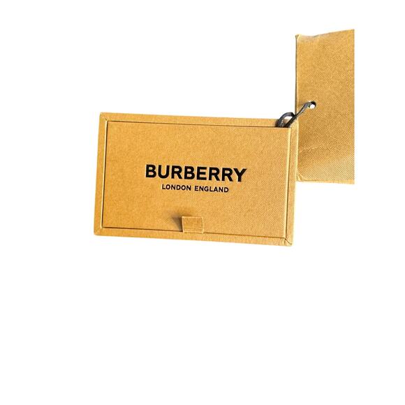 Burberry NWT Bolt Cufflinks in Palladium/Dark Brass - Picture 8 of 9